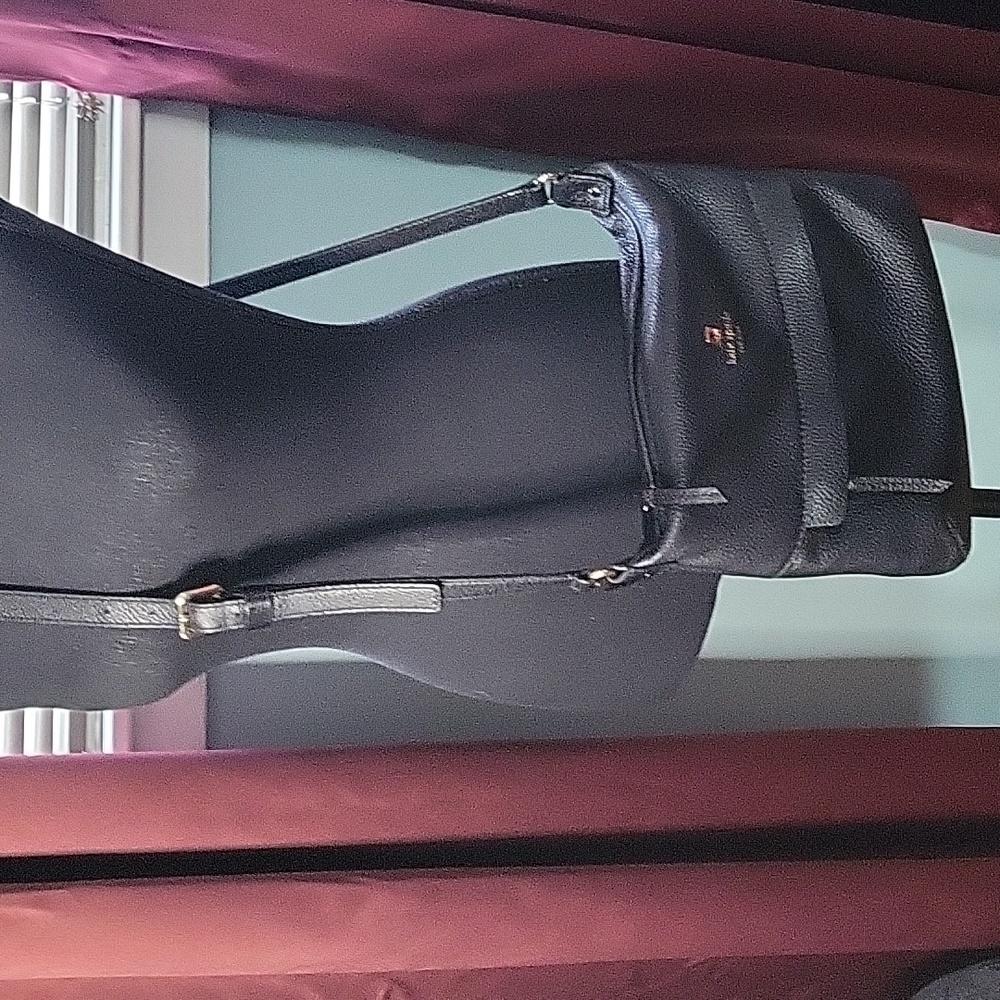 Black leather zip top Kate spade adjustable crossbody bag